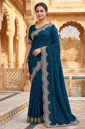 teal georgette embroidered saree with thread work
