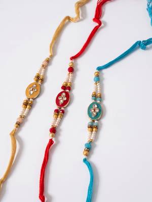 set of 3 multicolor artificial beads & white pearls thread rakhi with roli chawal 5