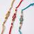 set of 3 multicolor artificial beads & white pearls thread rakhi with roli chawal