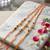 set of 3 artificial beads orange thread rakhi with roli chawal chandan mishri