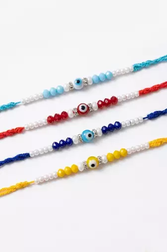 set of 4 multicolor evil eye thread rakhi with roli chawal chandan mishri
