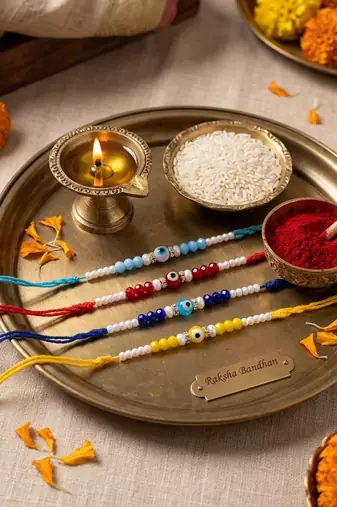 set of 4 multicolor evil eye thread rakhi with roli chawal chandan mishri