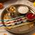 set of 4 multicolor evil eye thread rakhi with roli chawal chandan mishri