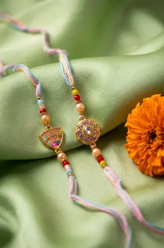 set of 2 gold toned artificial stones & beads thread rakhi with roli chawal chandan