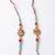 set of 2 multicolor artificial beads thread rakhi with roli chawal chandan mishri
