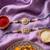 set of 2 white pearls thread rakhi with roli chawal chandan mishri