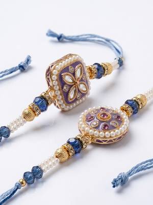 set of 2 white pearls thread rakhi with roli chawal chandan mishri 3
