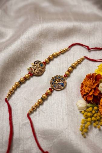 set of 2 peacock & ghungroo design multicolor thread rakhi with roli chawal chandan