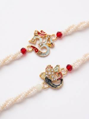 set of 2 white pearls om & ganesh ji thread rakhi with roli chawal chandan mishri 4
