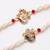 set of 2 white pearls om & ganesh ji thread rakhi with roli chawal chandan mishri
