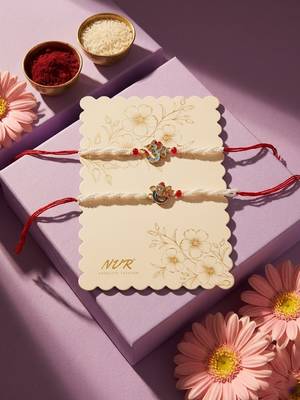 set of 2 white pearls om & ganesh ji thread rakhi with roli chawal chandan mishri 5