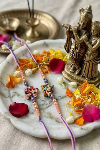 set of 2 krishna ji & ganesh ji beaded religious thread rakhi with roli chawal