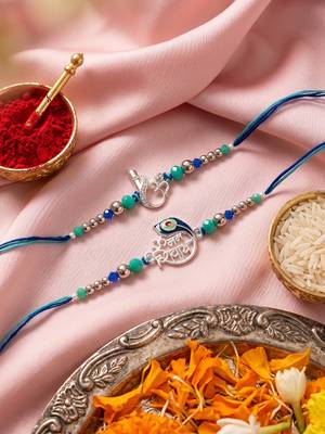 set of 2 silver toned beaded religious thread rakhi with roli chawal chandan mishri 1