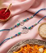 set of 2 silver toned beaded religious thread rakhi with roli chawal chandan mishri