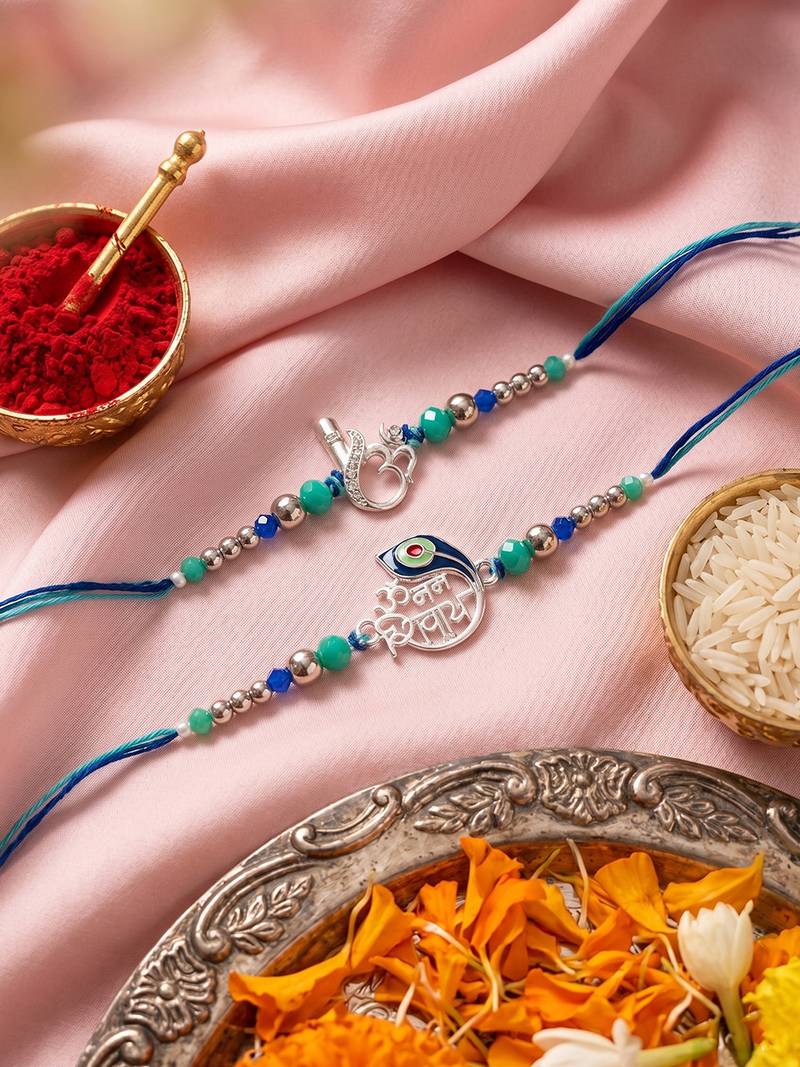 set of 2 silver toned beaded religious thread rakhi with roli chawal chandan mishri
