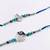 set of 2 silver toned beaded religious thread rakhi with roli chawal chandan mishri