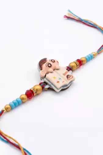 kids shinchan character artificial beads thread rakhi with roli chawal chandan mishri