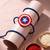 stylish red & blue avengers design kids rakhi with roli chawal chandan mishri
