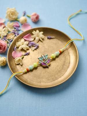 multicolor artificial beads ganesh ji thread rakhi with roli chawal chandan mishri 1