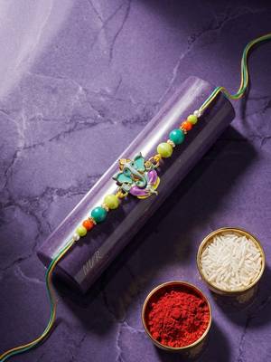 multicolor artificial beads ganesh ji thread rakhi with roli chawal chandan mishri 2