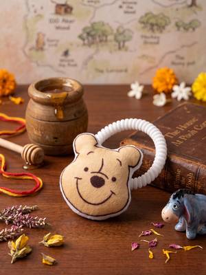 kids pooh character artificial beads rakhi with roli chawal chandan mishri 4