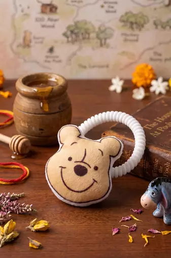 kids pooh character artificial beads rakhi with roli chawal chandan mishri