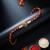 artificial beads decorative om design religious thread rakhi with roli chawal chandan