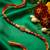artificial beads decorative om design religious thread rakhi with roli chawal chandan