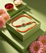 om motif divine religious thread rakhi with roli chawal chandan mishri