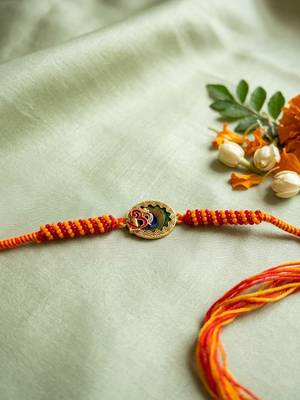 om motif divine religious thread rakhi with roli chawal chandan mishri 2