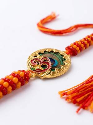om motif divine religious thread rakhi with roli chawal chandan mishri 3