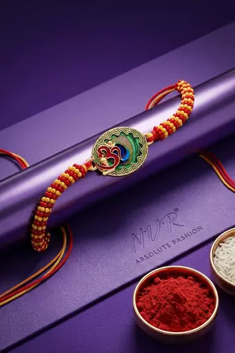 om motif divine religious thread rakhi with roli chawal chandan mishri