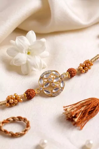 rudraksh & kundan studded gold toned thread rakhi with roli chawal chandan mishri