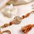 rudraksh & kundan studded gold toned thread rakhi with roli chawal chandan mishri