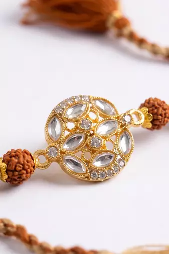 rudraksh & kundan studded gold toned thread rakhi with roli chawal chandan mishri
