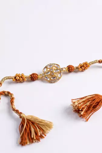rudraksh & kundan studded gold toned thread rakhi with roli chawal chandan mishri