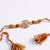 rudraksh & kundan studded gold toned thread rakhi with roli chawal chandan mishri