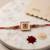 square design multicolor artificial stones & pearls thread rakhi with roli chawal