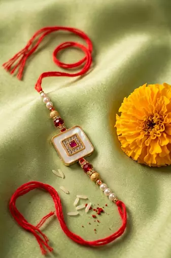 square design multicolor artificial stones & pearls thread rakhi with roli chawal