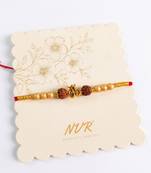 om design rudraksh thread rakhi with roli chawal chandan mishri