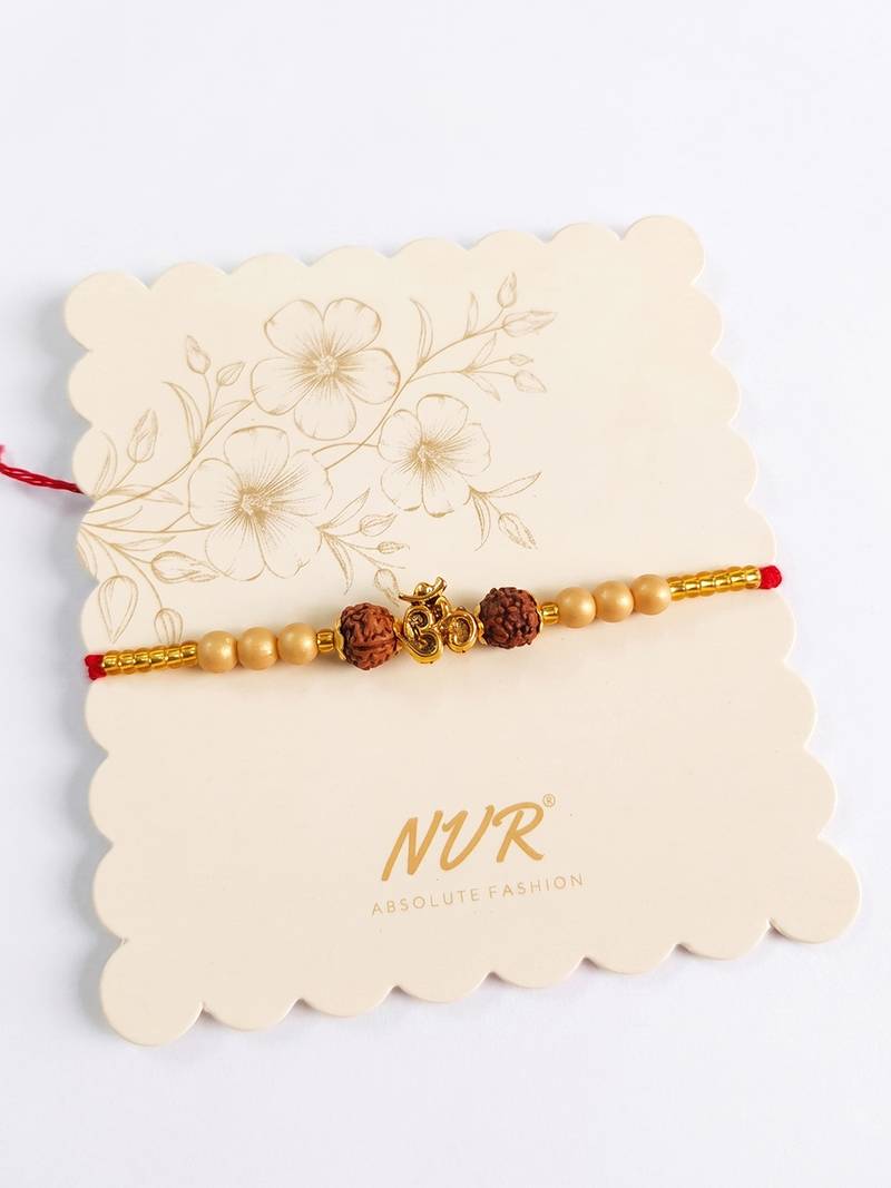 om design rudraksh thread rakhi with roli chawal chandan mishri