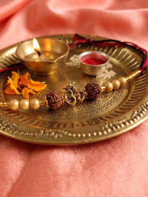 om design rudraksh thread rakhi with roli chawal chandan mishri 2