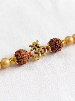 om design rudraksh thread rakhi with roli chawal chandan mishri 3