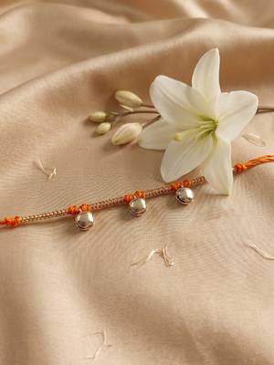 golden ghungroo thread rakhi with roli chawal chandan mishri 1