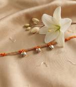 golden ghungroo thread rakhi with roli chawal chandan mishri