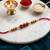 religious rudraksh & red thread rakhi with roli chawal chandan mishri