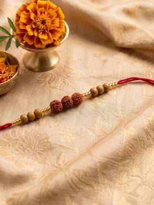 religious rudraksh & red thread rakhi with roli chawal chandan mishri 2