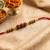 religious rudraksh & red thread rakhi with roli chawal chandan mishri