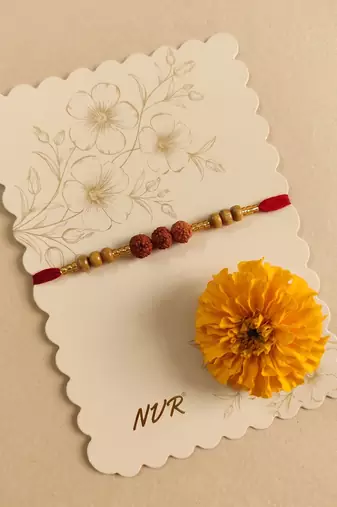 religious rudraksh & red thread rakhi with roli chawal chandan mishri