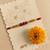 religious rudraksh & red thread rakhi with roli chawal chandan mishri